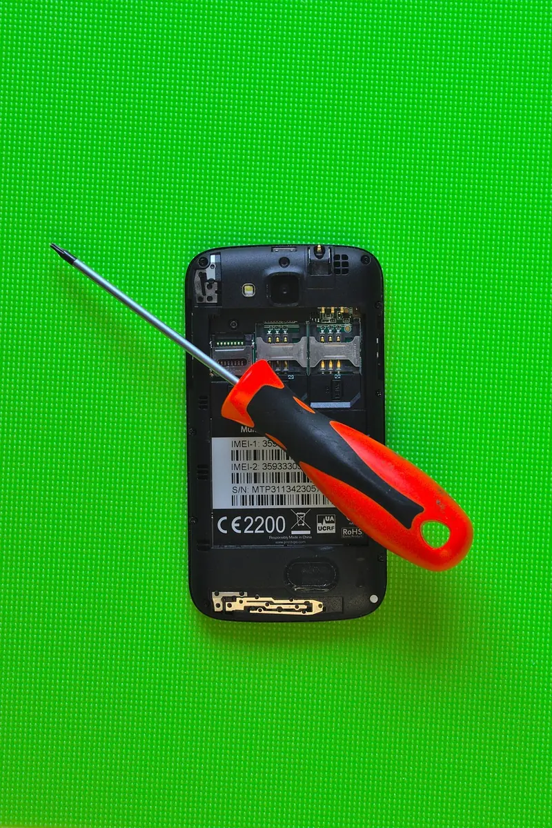 Smartphone screen repair with precision screwdriver
